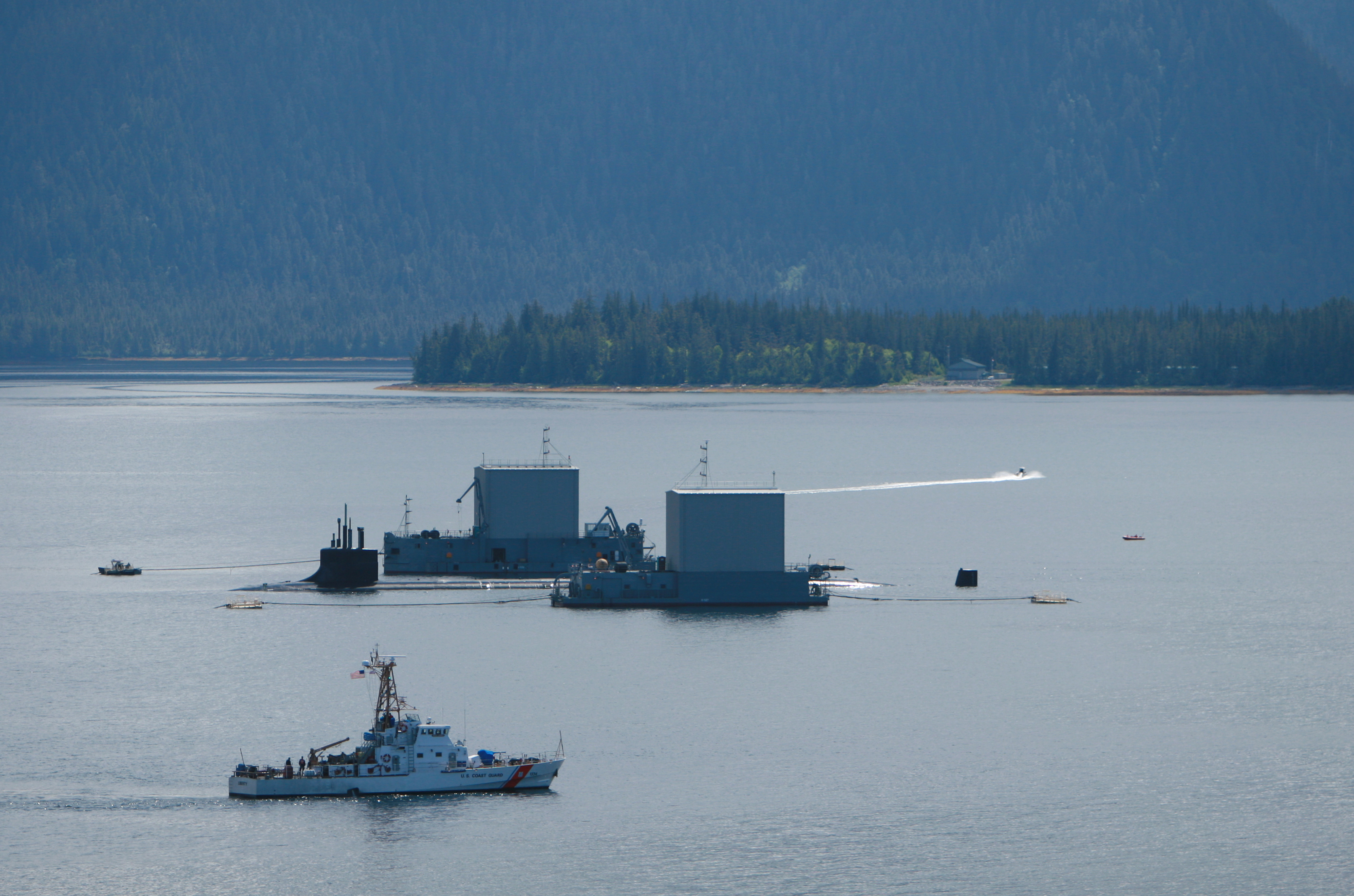 This is an image of Navy and Coast Guard vessels at Southeast Alaska Acoustic Measurement Facility near Ketchikan, Alaska.
